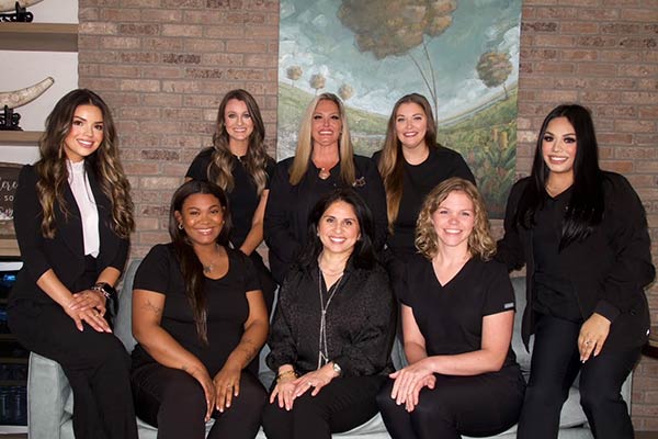 dentist veena bhat and the north fulton smiles team
